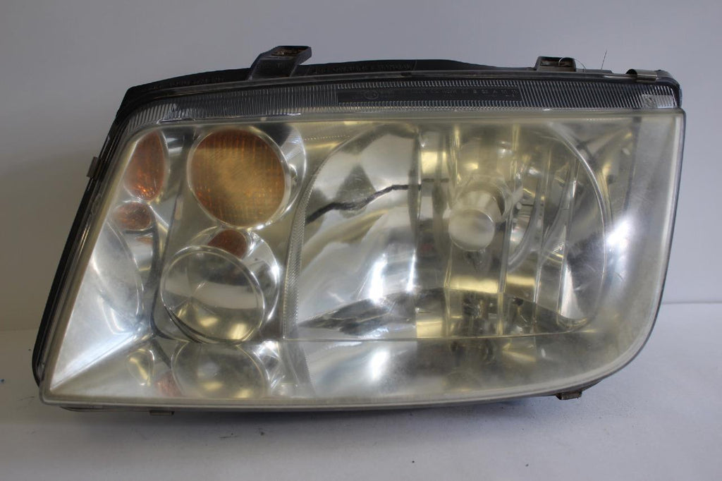 2002-2007 VOLKSWAGEN DRIVER SIDE FRONT HEADLIGHT LAMP - BIGGSMOTORING.COM